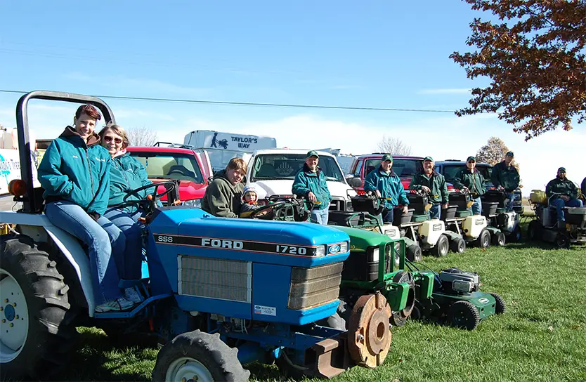 Taylor's Way team group photo representing four generations of family-owned lawn, tree, and pest care in Princeton, Illinois